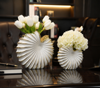 White ceramic seashell vase