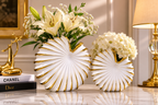White ceramic seashell vase