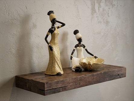 African woman statue with a storage tray