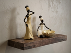 African woman statue with a storage tray