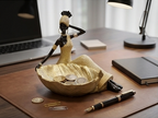 African woman statue with a storage tray