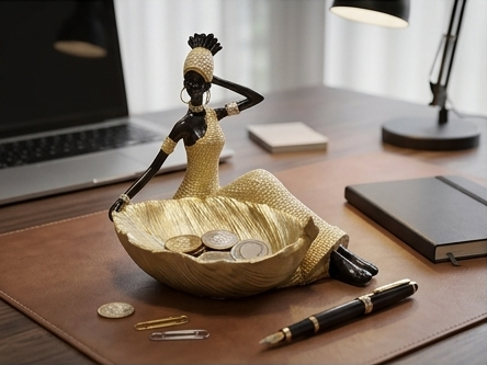 African woman statue with a storage tray