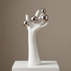 Surreal Hand Sculpture with Silver Orbs – Modern Decorative Statue