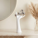 Surreal Hand Sculpture with Silver Orbs – Modern Decorative Statue