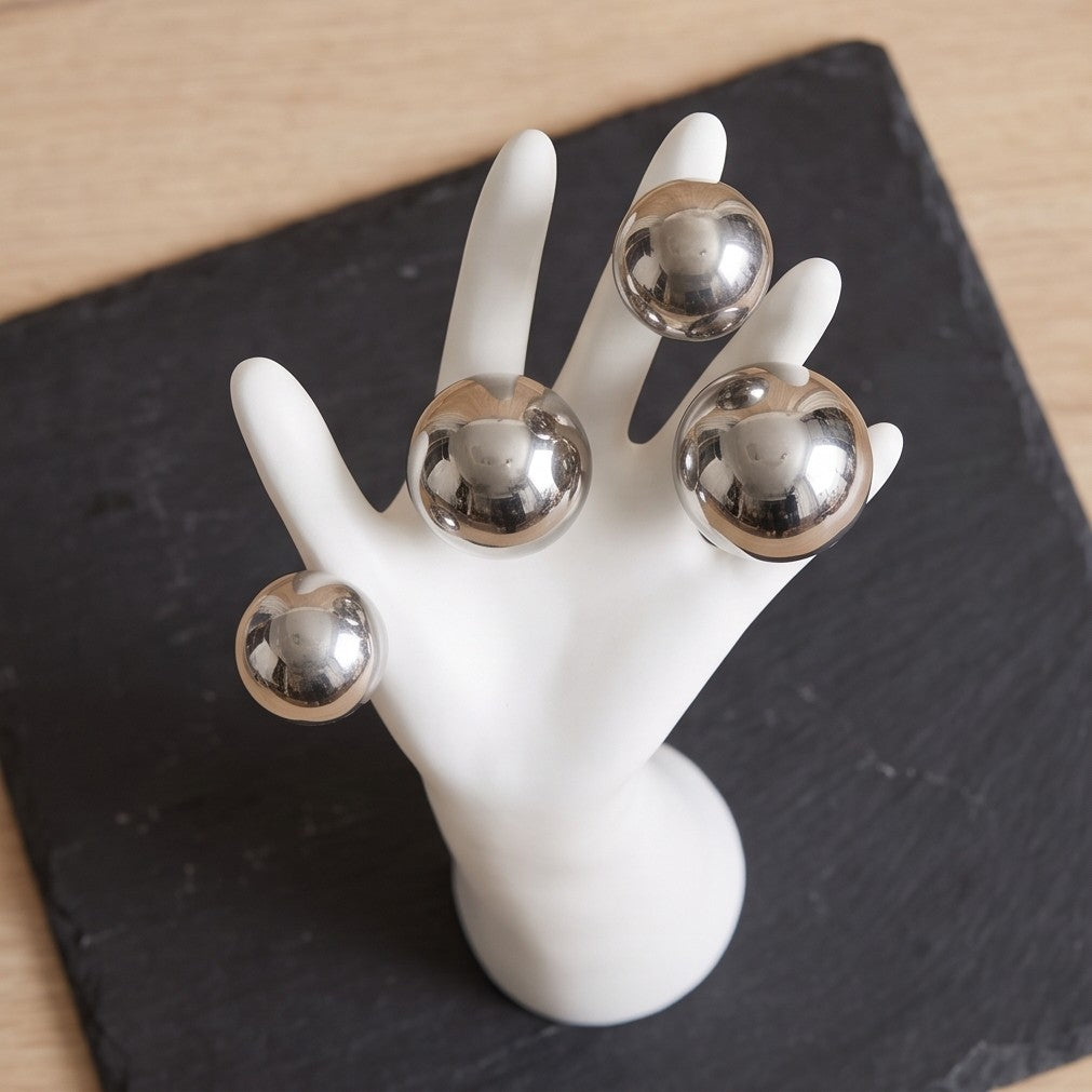 Surreal Hand Sculpture with Silver Orbs – Modern Decorative Statue