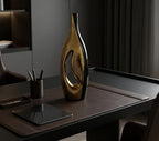 Modern Black and Gold Ceramic Vase with Geometric Hollow Center