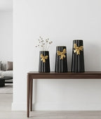 Ceramic, black-striped bow vases