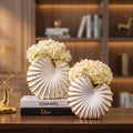 White ceramic seashell vase