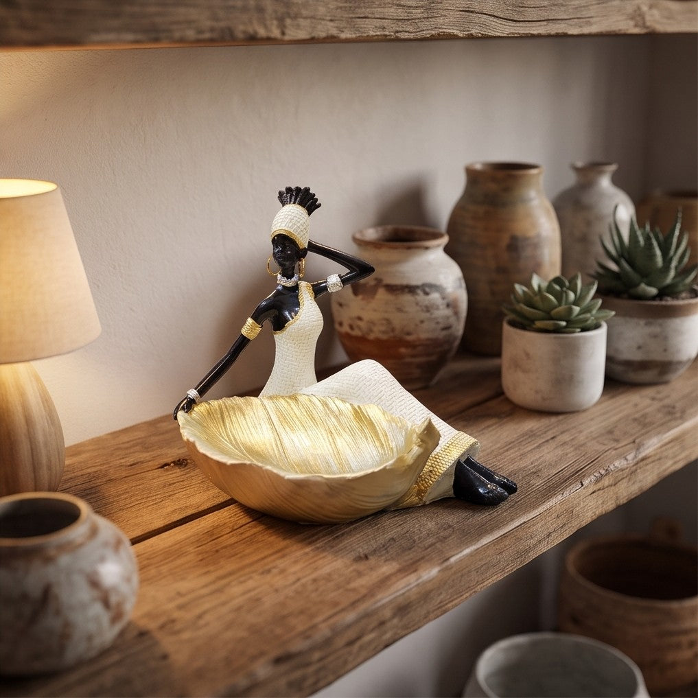African woman statue with a storage tray