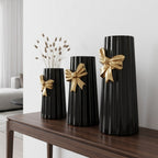 Ceramic, black-striped bow vases