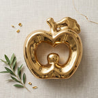 Glossy gold ceramic apple statue